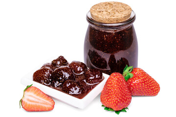 Strawberry jam in glass jar and fresh berries