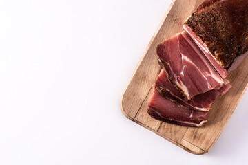 Dried and smoked meat isolated on white background. Top view. Copy space	