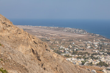 Fototapeta na wymiar View of the Kamari resoer, Mesa Vouno mountain, Santorini, Greece.