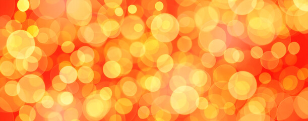 Golden abstract background bokeh red and yellow colors.