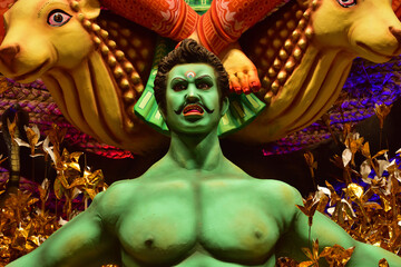 Close up view of an idol of Mahisashura who represents evil power in Durga puja which is the biggest festival of bengali