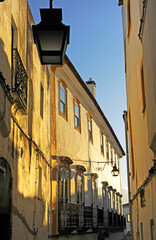 Narrow street in the historic centre of Evora, Portugal. The Historic Centre of Evora is a Unesco World Heritage Site.