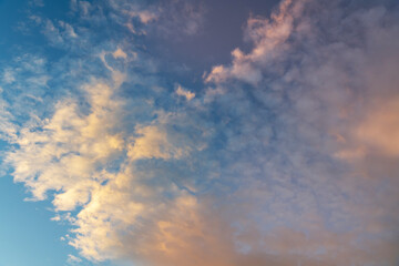 Beautiful colorful bright sunset sky with orange clouds. Nature sky background.