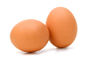 Raw eggs isolated on white background