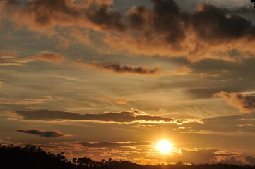 Sunset view with beautiful golden sky,the colorful sky lights in the evening	