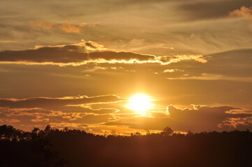 Sunset view with beautiful golden sky,the colorful sky lights in the evening	