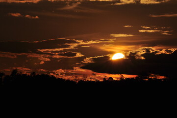 Sunset view with beautiful golden sky,the colorful sky lights in the evening	