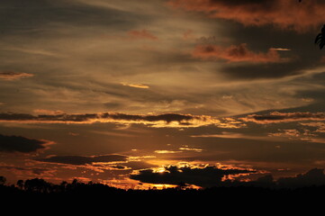 Sunset view with beautiful golden sky,the colorful sky lights in the evening	