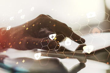 Creative abstract medical sketch and hand working with a digital tablet on background, Medicine and healthcare concept. Multiexposure