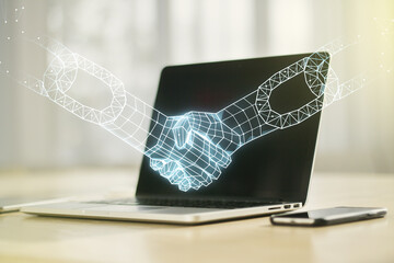 Creative abstract block chain technology sketch with handshake on modern laptop background, future...