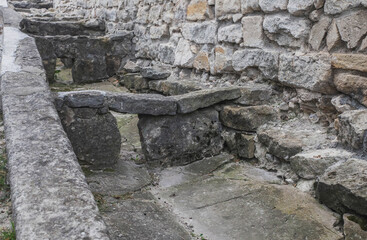 Ancient stone gutter with rapids in the castle