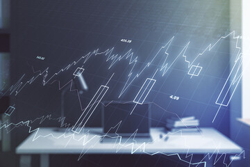 Multi exposure of abstract financial graph and modern desktop with pc on background, financial and trading concept