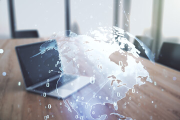 Multi exposure of abstract software development hologram with world map on laptop background, global research and analytics concept