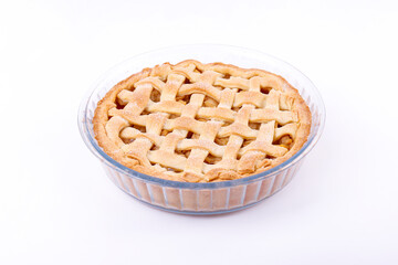 Traditional American Thanks Giving lattice pie isolated on white background. Homemade fruit tart baked to golden crust. Close up, copy space, top view.