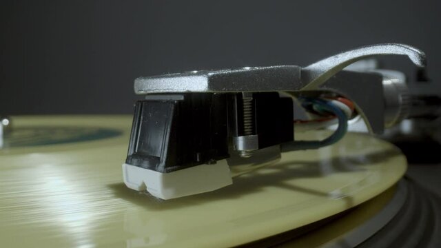 Close up footage of record player needle