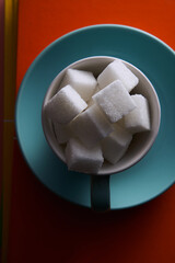 cup of white sugar cube