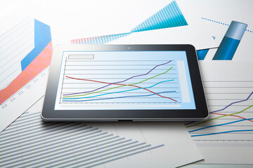 タブレット端末とグラフ資料