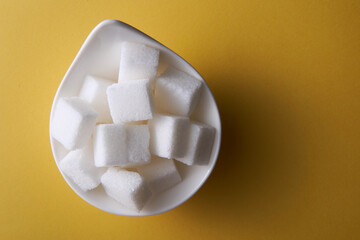 top view bowl of white sugar cube