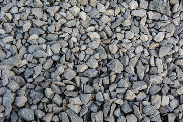 Small stones of gray colour texture background.
