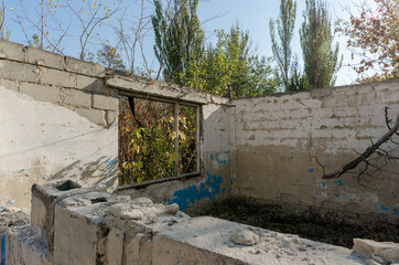 ruins of an old abandoned village house in Ukraine