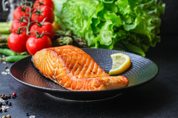 fried salmon fish bbq grill seafood portion fresh meal on the table  top view copy space for text food background rustic diet
 pescetarian