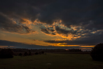 Sunset over the  heathland in the New Forest near Fordingbridge, UK in Autumn