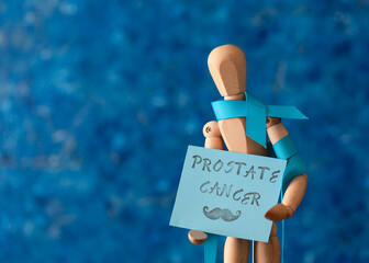 wood mannequin prostate cancer blue sings awareness