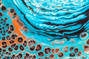 Colorful mix of acrylic vibrant colors. Fluid painting abstract texture.