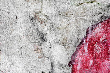 Fototapeta premium Texture of a concrete wall with cracks and scratches which can be used as a background