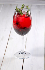 summer cocktail with fresh berries and fruits