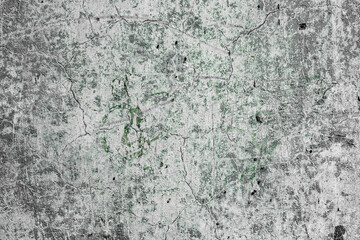 Texture of a concrete wall with cracks and scratches which can be used as a background