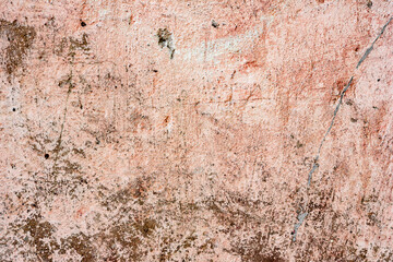 Texture of a concrete wall with cracks and scratches which can be used as a background