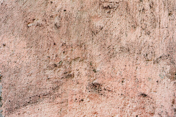 Texture of a concrete wall with cracks and scratches which can be used as a background