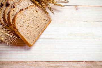 Rye bread. Bakery with crusty loaves and crumbs. Fresh loaf of rustic traditional bread with wheat...