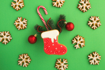 Fototapeta na wymiar Christmas gingerbread on the green background