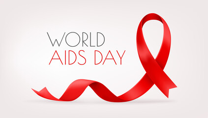 Red ribbon on red background. World AIDS day