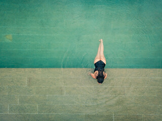 Woman in swimming pool