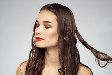 Fototapeta premium Beautiful woman fashionable hairstyle grooming naked shoulders bright makeup