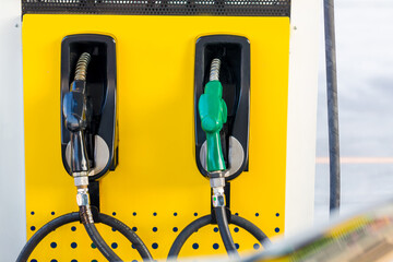 Fuel Pump, Gas Station, Gasoline.Colorful Petrol pump filling nozzles isolated on white background...