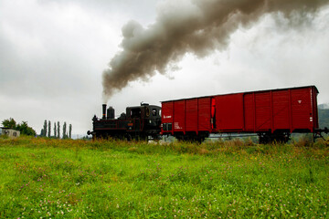 Fototapeta na wymiar Old steam machine in countryside.