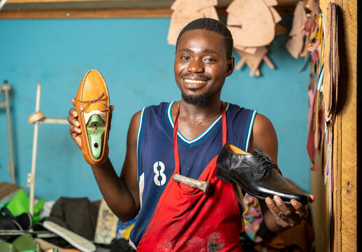 image of african man, with foot wear-workshop concept