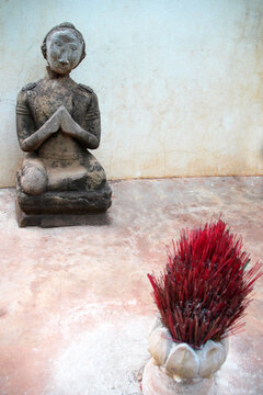 Stone sculpture of a grieving Buddhist monk, 5