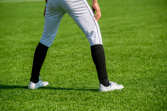 Talented athletes doing baseball training outdoors.