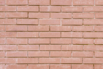 Brick wallpaper, texture. Background for creative design. There are scuffs on the weathered surface.