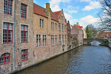 Fototapeta na wymiar Old medieval houses in Bruges on one of the city canals
