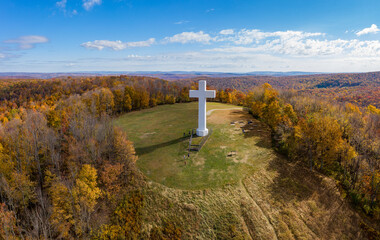 Aerial drone view of the metal structure of the Great Cross of Christ on Dunbar's Knob in...