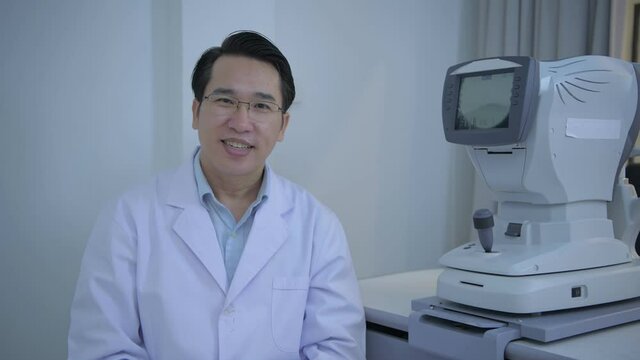 Optical shop concept. Asian doctors are interviewing about eye examination. 4k Resolution.