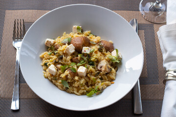Orzo pasta with chestnut champignon and feta cheese 
