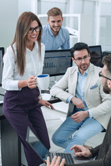 business woman and business team talking during work break