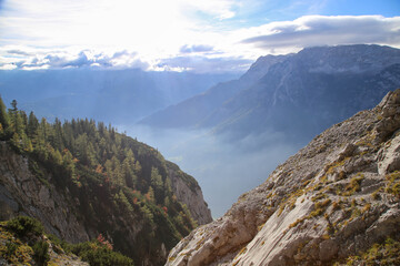 View of mountains and valley in the Alps near Hallein, Austria on a misty morning